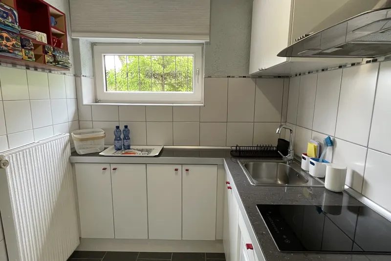 Kitchen with window and ceramic hob