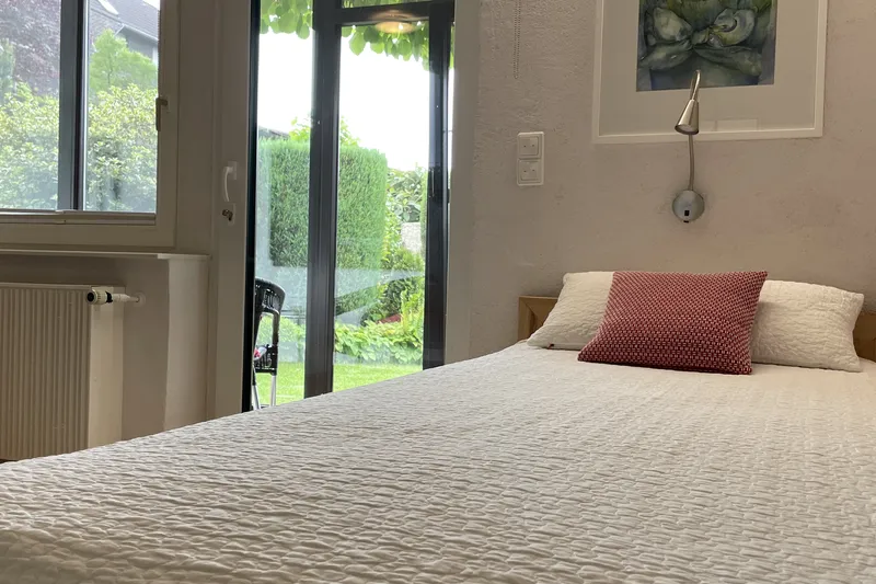 Double bed with terrace door to the garden