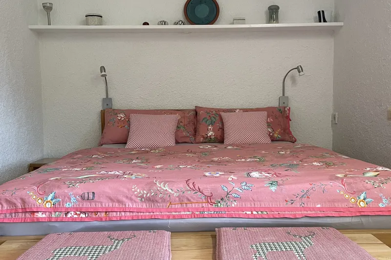 Sleeping area with bookshelf
